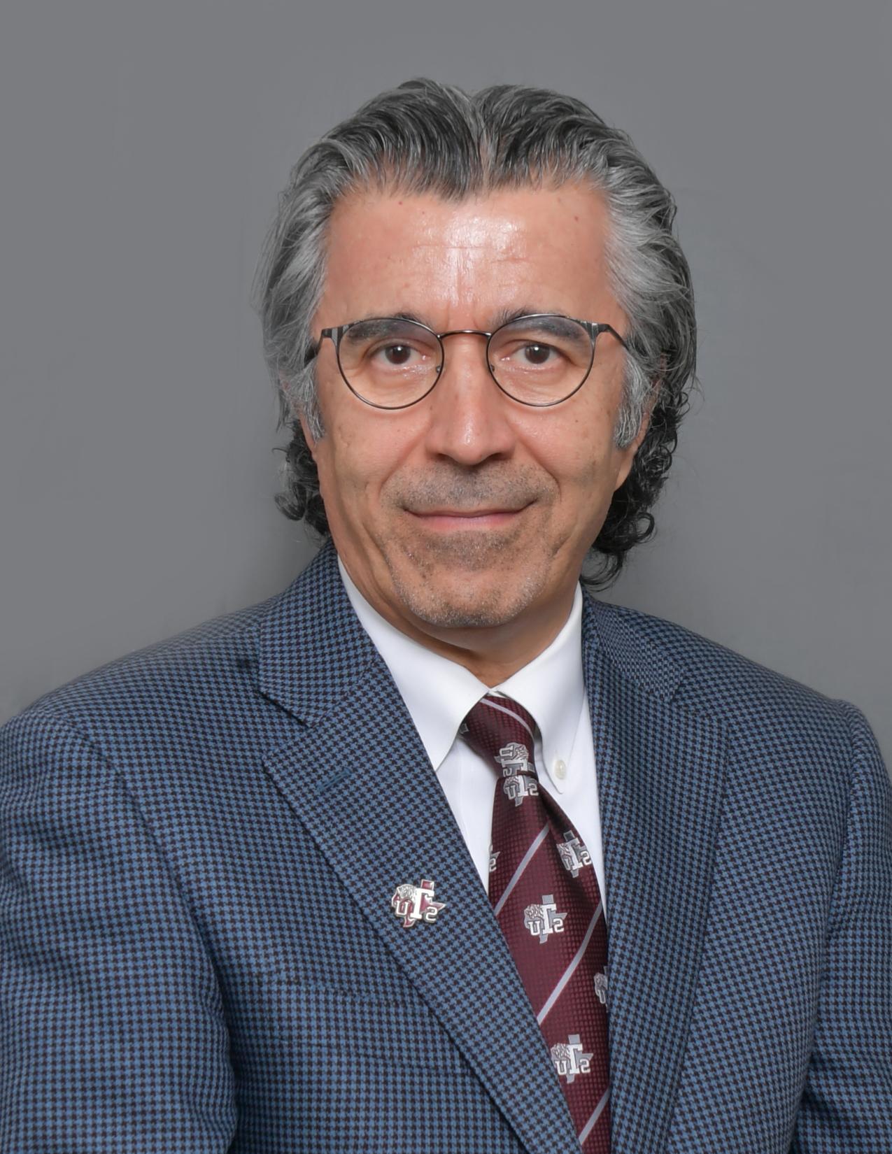 Dr. Rashid Mosavin, Dean